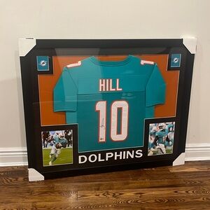 Signed and framed Tyreek hill dolphins  jersey